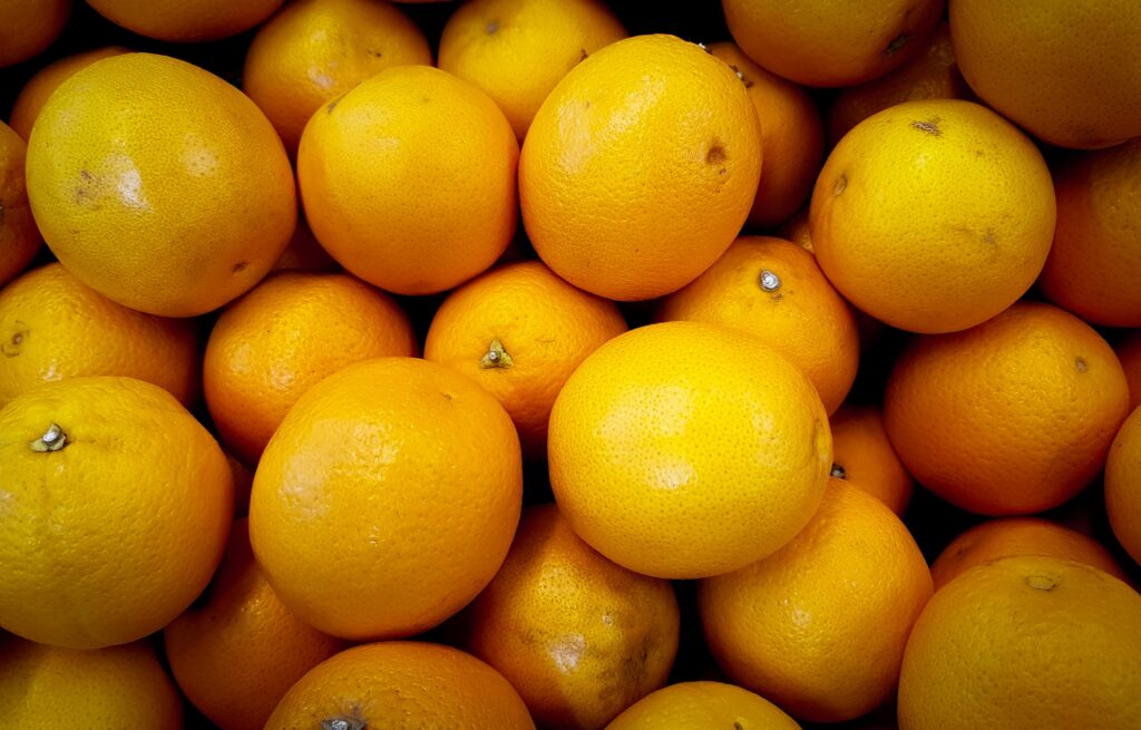 A close-up view of fresh oranges showcasing vibrant colors and textures.